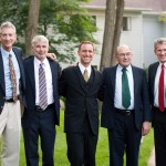 Five brothers standing together.